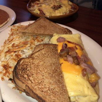 Log Cabin Restaurant - Meat lover omelet, w/ Hash brown & toast on side - Diners Near Me - Schofield, Wisconsin Log Cabin Restaurant - Meat lover omelet, w/ Hash brown & toast on side - Diners Near Me - Schofield, Wisconsin