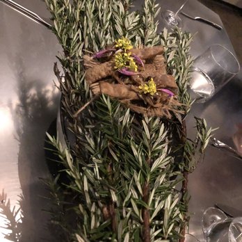 Alinea - A hazelnut (?) cracker topped with ???, - New American Near Me - Chicago, Illinois