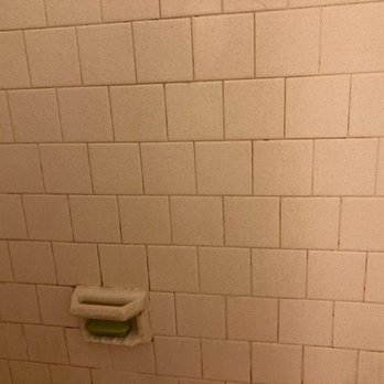Saving by Reglazing - BEFORE: discolored, dirty looking tile - Refinishing Services Near Me