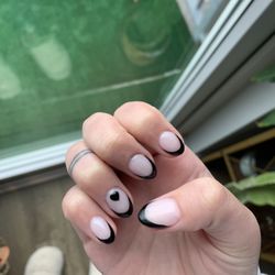 At Nails - Nude dip powder with black gel French tips/hearts! Cuteness!!