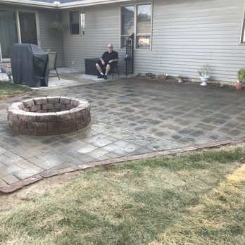 Stevens Property Services - a patio with a fire pit - Snow Removal Near Me - South Bend, Indiana Stevens Property Services - a patio with a fire pit - Snow Removal Near Me - South Bend, Indiana