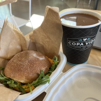 Copa Vida - Bacon Brekkie and Guatemalan kids brewed coffee with almond milk - Coffee & Tea Near Me - San Marcos, California Copa Vida - Bacon Brekkie and Guatemalan kids brewed coffee with almond milk - Coffee & Tea Near Me - San Marcos, California