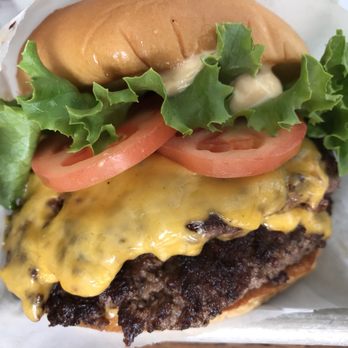 Shake Shack Coral Gables - ShackBurger - looked better than it tasted.  Burger was cooked medium well rather than medium. - Burgers Near Me - Coral Gables, Florida