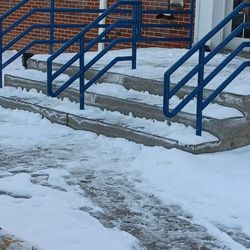 United States Postal Service - January 2nd afternoon. Hazardous snow/ice on steps that had not been cleared.