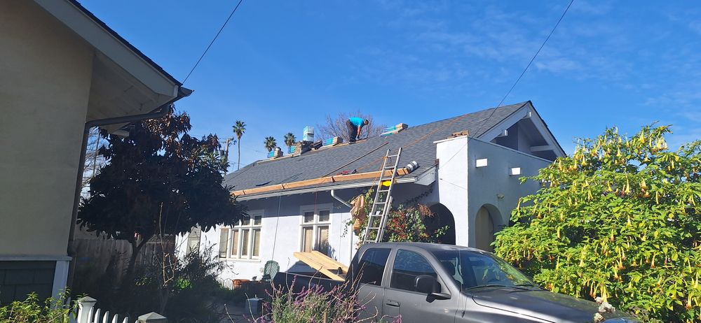 Slide of TNT Roofing