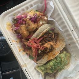 Tacos: cauliflower, brisket, braised beef