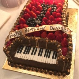 Piano Cake!!  Done beautifully by the team at Elegant Deserts!