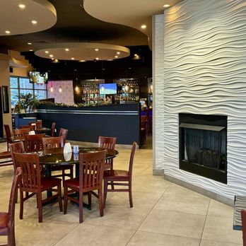 Nick's Taverna - Another view of their decor and a shot of the bar area in the background - Mediterranean Near Me - Ashburn, Virginia Nick's Taverna - Another view of their decor and a shot of the bar area in the background - Mediterranean Near Me - Ashburn, Virginia