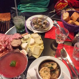 Escargot, charcuterie board, French onion soup, cosmopolitan and a mojito!