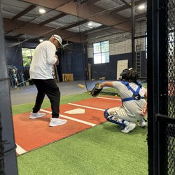 Batting A Thousand - Catching lesson in the cage