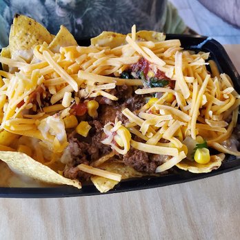 Hot Head Burritos - a close up of a plate of nachos - Mexican Near Me - Longview, Texas Hot Head Burritos - a close up of a plate of nachos - Mexican Near Me - Longview, Texas