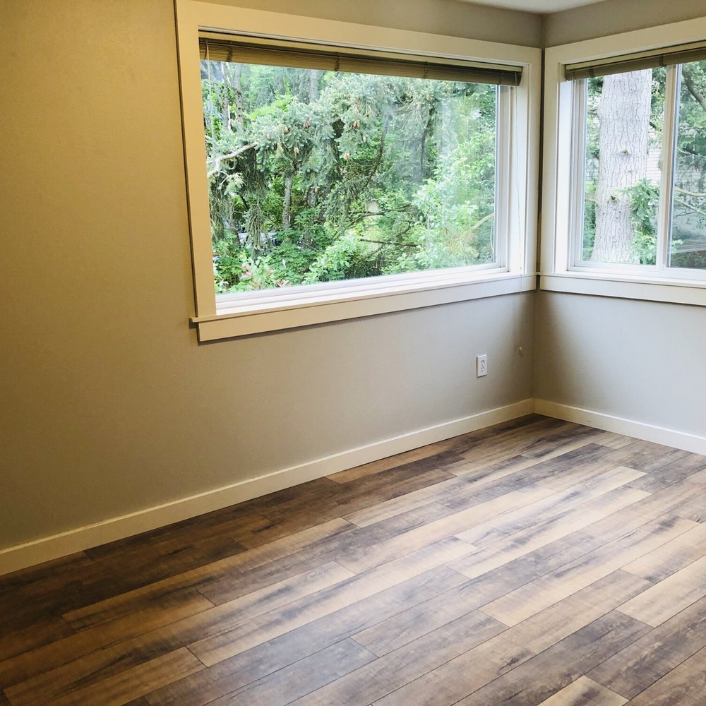 WA Flooring - a corner of a room with wood floors - Flooring Near Me WA Flooring - a corner of a room with wood floors - Flooring Near Me