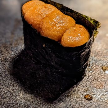 Zilla Sake - a piece of sushi on a table - Sushi Bars Near Me - Portland, Oregon Zilla Sake - a piece of sushi on a table - Sushi Bars Near Me - Portland, Oregon