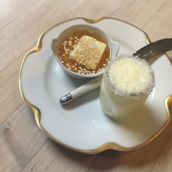 Talula's Table - Honey Sesame Butter (left), sea salt butter (right)- served with assorted fresh baked in store bread - New American Near Me - Kennett Square, Pennsylvania