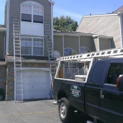Preferred Property Improvements - Replacing trim on a townhouse