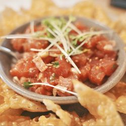 Pacific Catch - Original Ahi Poke. Mildly fishy, but still clean and tender. Comes with crunchy wonton chips.