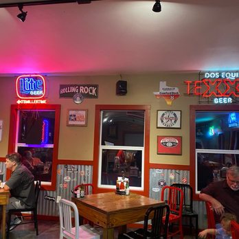 Potato Shack - people sitting at tables in a restaurant - American Near Me - Huntsville, Texas Potato Shack - people sitting at tables in a restaurant - American Near Me - Huntsville, Texas