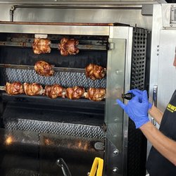 Maui Mike's Fire-Roasted Chicken - Owner Mike and the chickens!