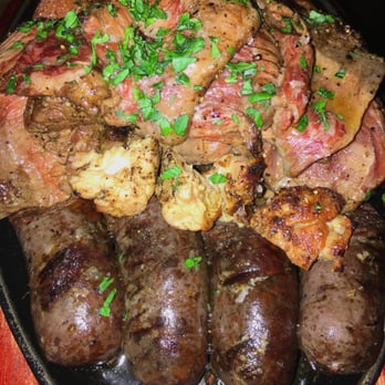 Ox - Grilled Short Rib, House Chorizo & Morcilla Sausages, Skirt Steak,* Sweetbreads $70 - Argentine Near Me - Portland, Oregon Ox - Grilled Short Rib, House Chorizo & Morcilla Sausages, Skirt Steak,* Sweetbreads $70 - Argentine Near Me - Portland, Oregon