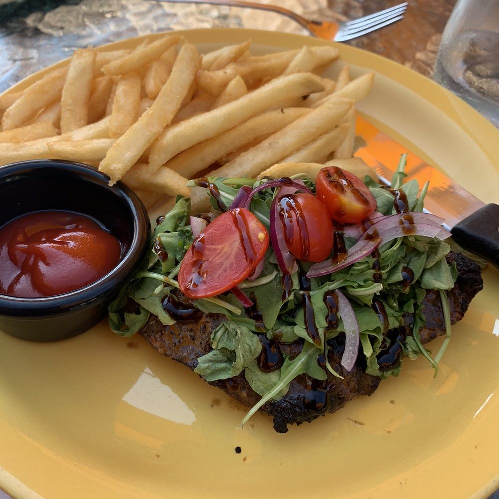Steak and frites.  Flat iron steak with arugula salad. Very tough.