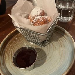 Fried cheese donut bites and cherry sauce