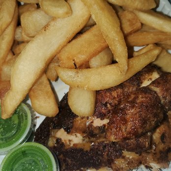 El Pollo Rico - 1/4 chicken with double fries. The green sauce is very hot (love it) - Latin American Near Me - Wheaton, Maryland