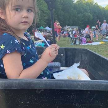 White Path Distillery - a little girl in a wheelbarrow - Distilleries Near Me - Ellijay, Georgia
