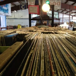 Doo Wops Cd's Games Movies and Records & Vcr Repar - There's a lot of $2 albums in the tables outside the store.