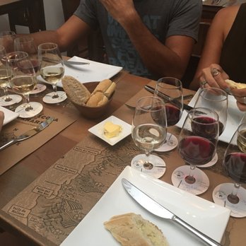 Bocanáriz - Four flights of wine and the bread/cheesy butter that came with the meal - Wine Bars Near Me - Santiago, RM Bocanáriz - Four flights of wine and the bread/cheesy butter that came with the meal - Wine Bars Near Me - Santiago, RM