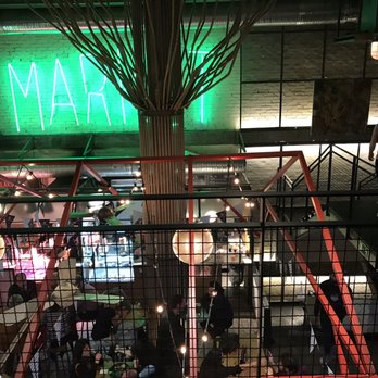 Mad Mad Vegan - Photo of market from upper-level dining room - Burgers Near Me - Madrid, M Mad Mad Vegan - Photo of market from upper-level dining room - Burgers Near Me - Madrid, M