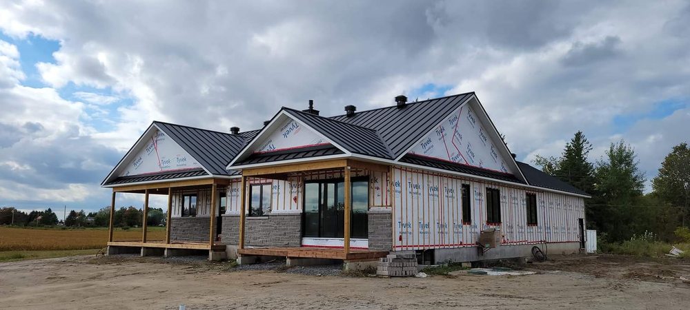 Slide of Sagan Commercial Roofing