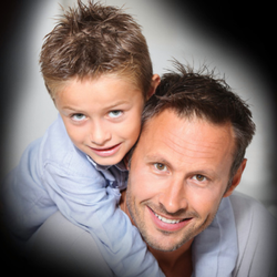 Roosters Men's Grooming Center - Father and son getting haircuts together is a great bonding experience.