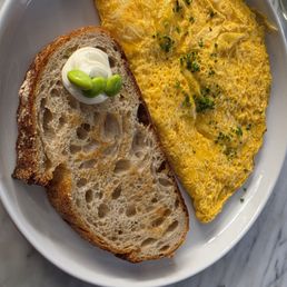 Plain Omlette with toast. Plain Omlette with toast.