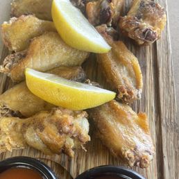 Wings with bbq, hot sauce & blue cheese dressing Wings with bbq, hot sauce & blue cheese dressing