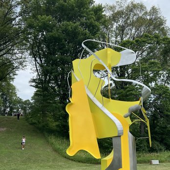 Storm King Art Center - I love the colorful ones. Others are blue, green, orange or red. See person for scale. - Art Museums Near Me - New Windsor, New York