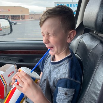 Hot Dog on a Stick - a young boy in a car - Hot Dogs Near Me - Sandy, Utah Hot Dog on a Stick - a young boy in a car - Hot Dogs Near Me - Sandy, Utah