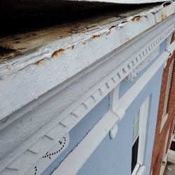 On Top Roof Repairs - Lazy and cheap roof install. They didn't attach the rubber roof to the side of the house. These guys cost me big bucks