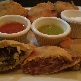 VSPOT - Empanada trio for $10...Spinach, Black Bean and Jamaican with their own different salsas and sour cream. - Vegan Near Me - Brooklyn, New York VSPOT - Empanada trio for $10...Spinach, Black Bean and Jamaican with their own different salsas and sour cream. - Vegan Near Me - Brooklyn, New York