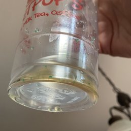 This is what was at the bottom of the drink it is green stuff. This is what was at the bottom of the drink it is green stuff.