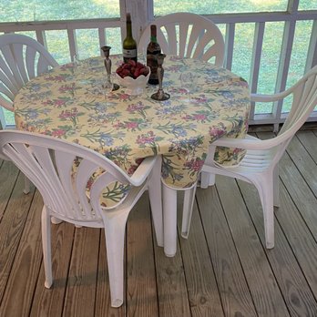 Small Town Estate Sales - Table and chairs staged with a beautiful tablecloth, wine chiller and glasses for an elegant look! - Estate Liquidation Near Me - Cohutta, Georgia Small Town Estate Sales - Table and chairs staged with a beautiful tablecloth, wine chiller and glasses for an elegant look! - Estate Liquidation Near Me - Cohutta, Georgia