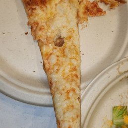 a slice of pizza on a plate