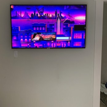 Bay Area Wall Mounts - TV on low profile mount - Home Theatre Installation Near Me