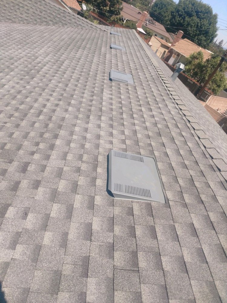 Slide of Delcid Roofing