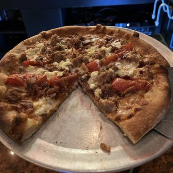Blaze - Pizza with sausage, roasted tomato, bacon & goat cheese - Bars Near Me - Bangor, Maine