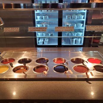 Yummy Yaki - Sauces area of build-your-own bar - Sushi Bars Near Me - Acworth, Georgia