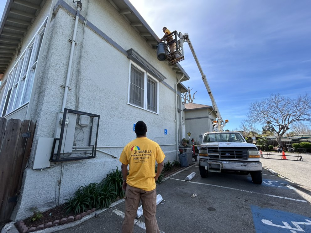 Slide of Umbrella Plastering & Roofing