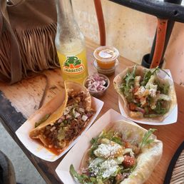 Grilled salmon tacos, quesabirria