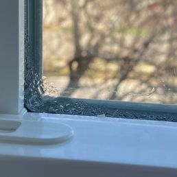 Condensation on inside of brand new windows. Condensation on inside of brand new windows.