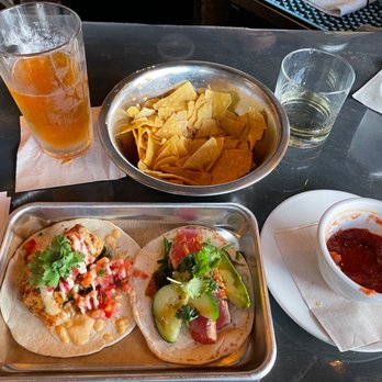 Union Taco - Left to Right: El Guapo Draft, Mahi taco, Chips, Ahi Tuna taco, Milagro Reposado Tequila, Salsa, water. - Tacos Near Me - Norfolk, Virginia Union Taco - Left to Right: El Guapo Draft, Mahi taco, Chips, Ahi Tuna taco, Milagro Reposado Tequila, Salsa, water. - Tacos Near Me - Norfolk, Virginia