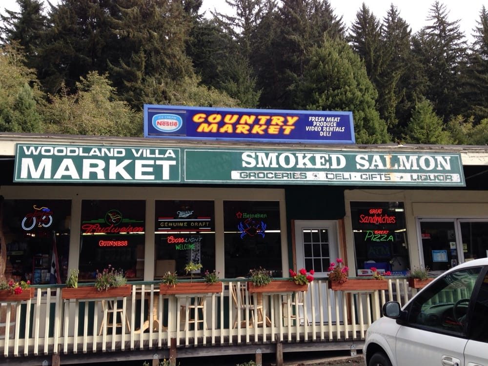 Woodland Villa Country Market Logo